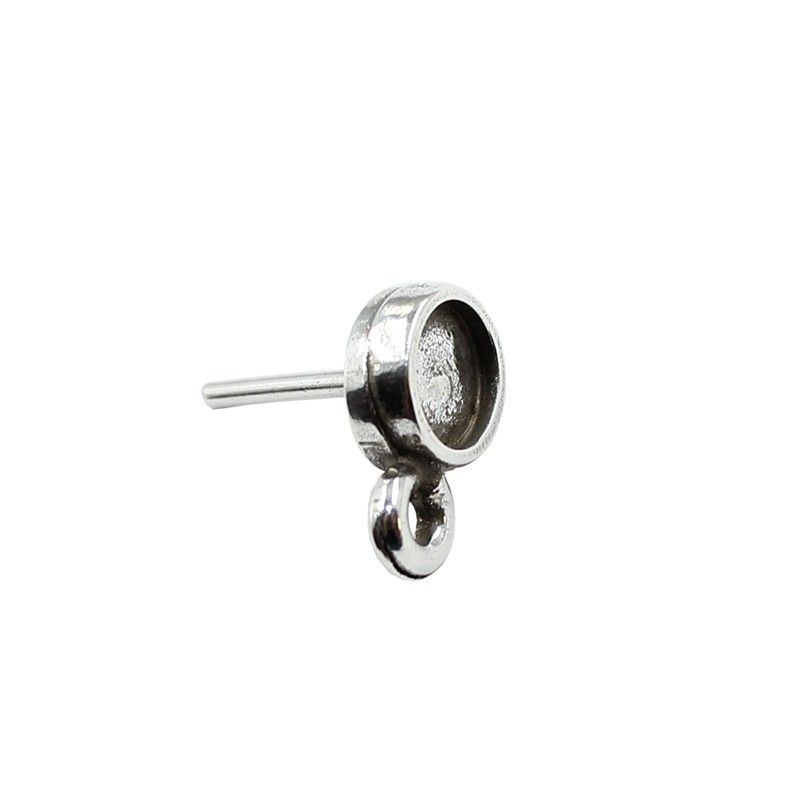 Boucles d'oreilles avec une bague pour cabochon