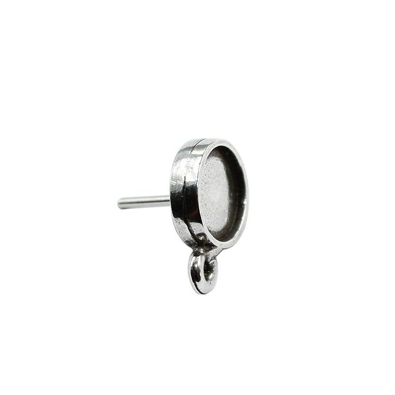 Earrings with a ring for cabochon